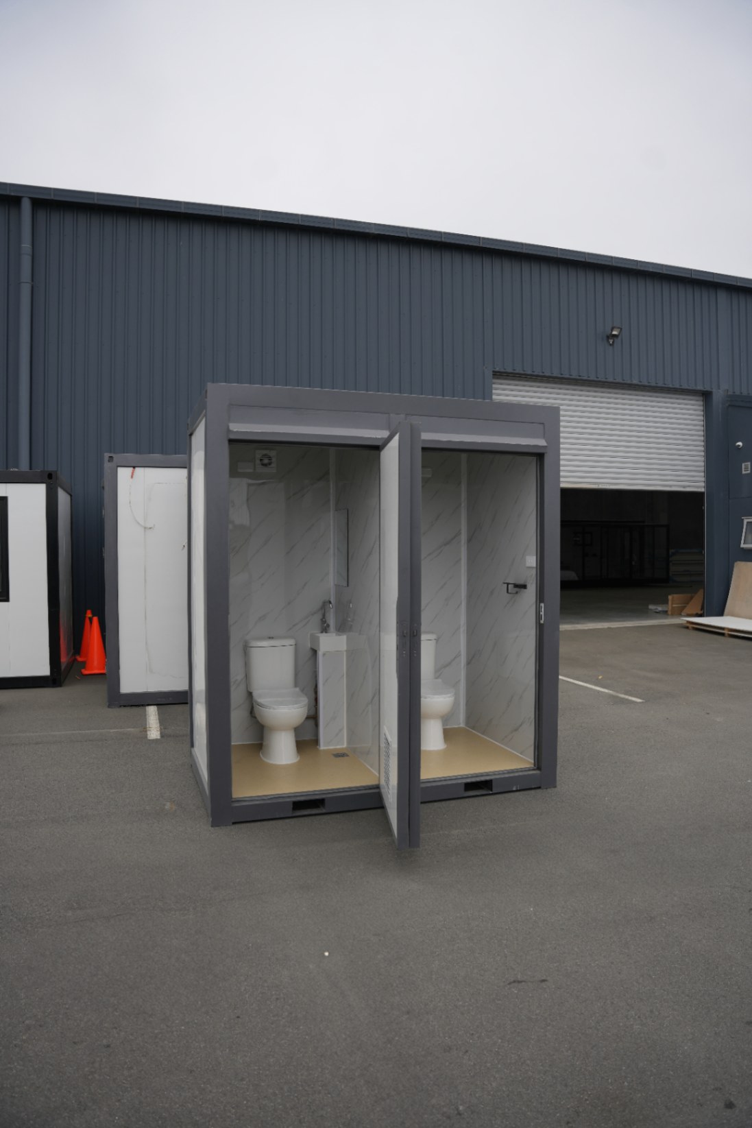 Double toilet — both doors open