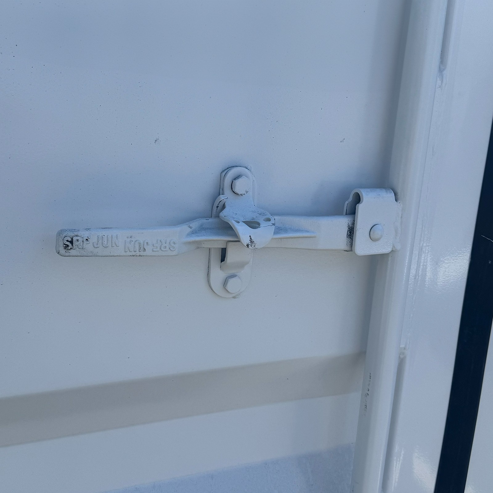 Close-up of tamper-resistant door hardware