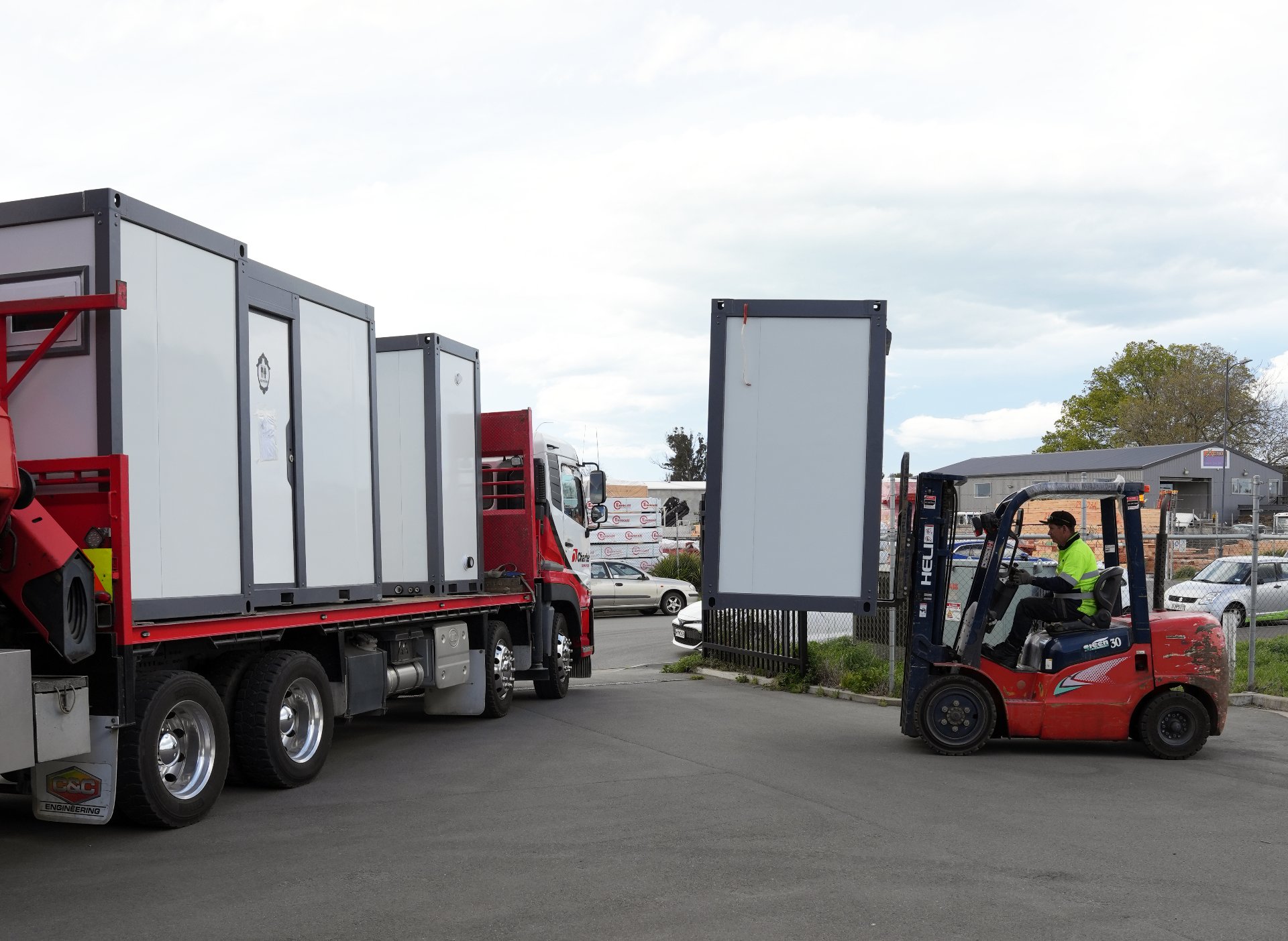 Portable cabin being hiab-lifted onto a New Zealand farm