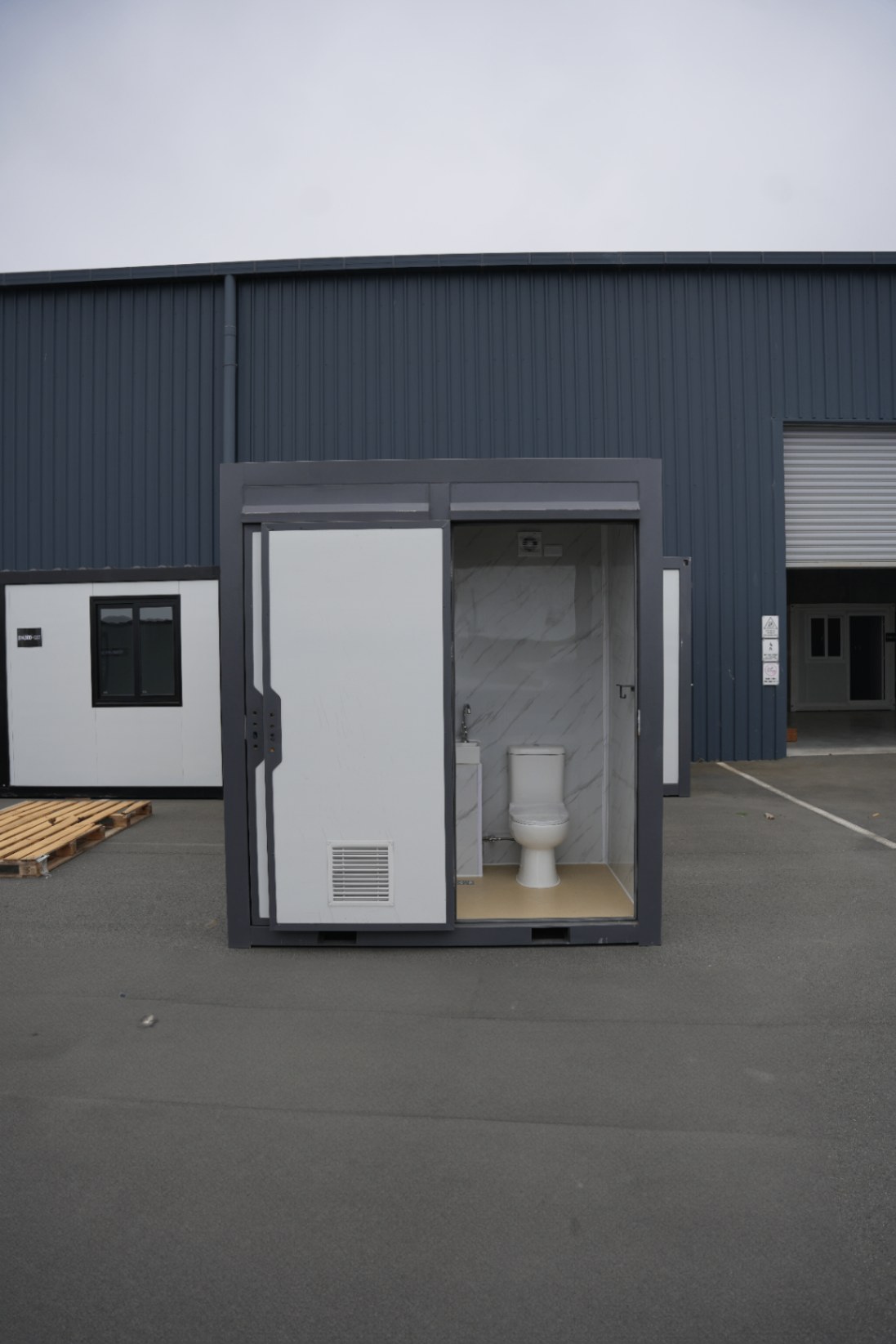 Double toilet — one compartment open